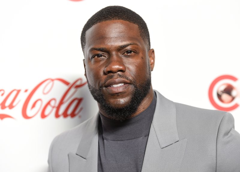 FILE - In this April 4, 2019 file photo, Kevin Hart poses for photos at the Big Screen Achievement Awards at Caesars Palace in Las Vegas. Hart has been injured in a car crash in the hills above Malibu on Sunday, Sept. 1. (Photo by Chris Pizzello/Invision/AP, File)